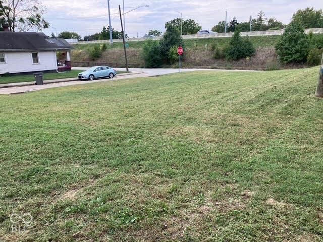 2701 Shriver Avenue, Indianapolis, IN 46208 Expansive grass lot with a gentle slope