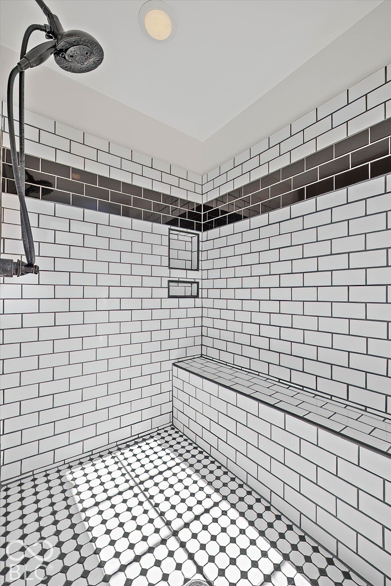 WOW! Look at this huge custom tile walk-in shower!