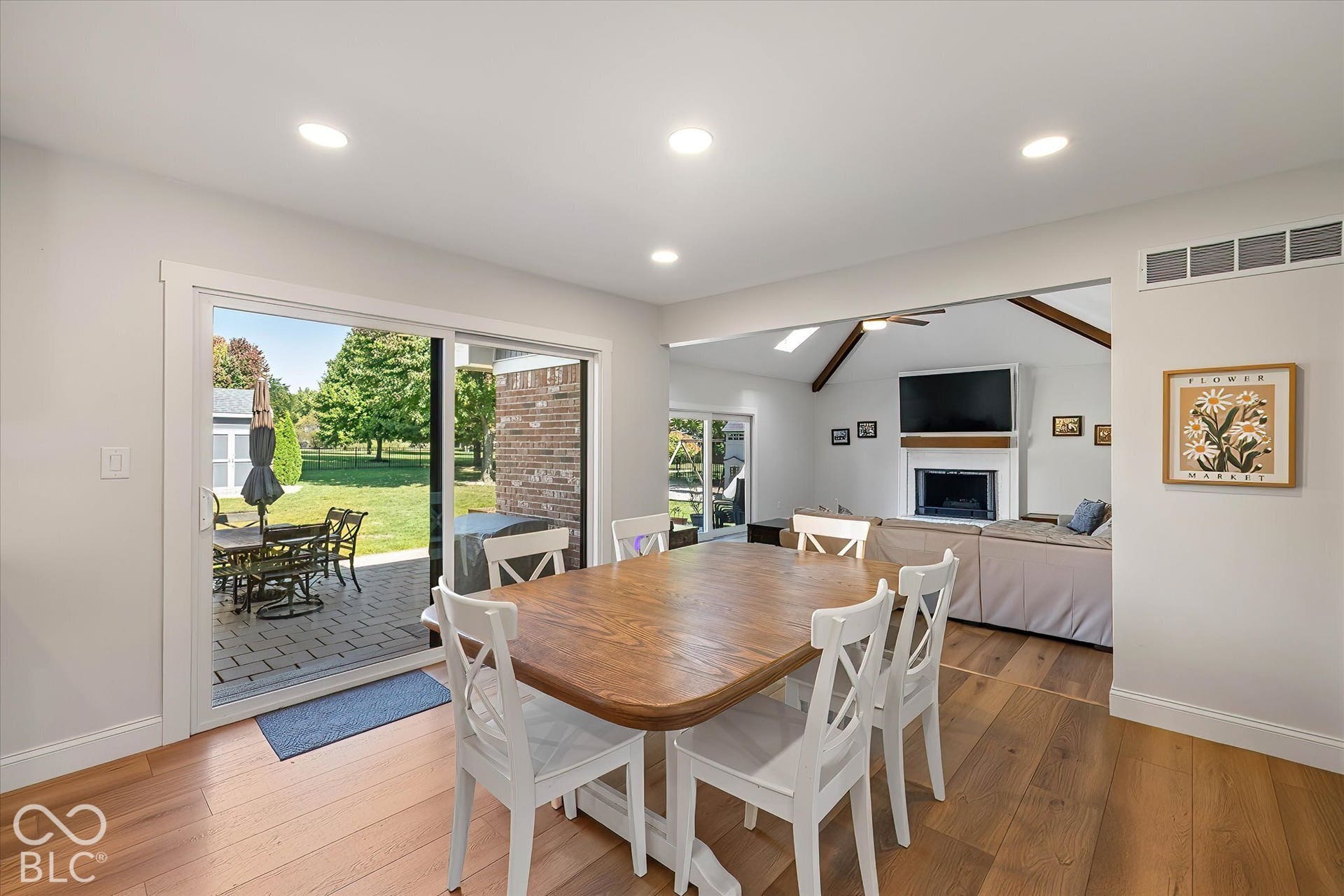 Spacious eat-in space in kitchen overlooking Family Room. New Sliding Door leading to back yard patio.