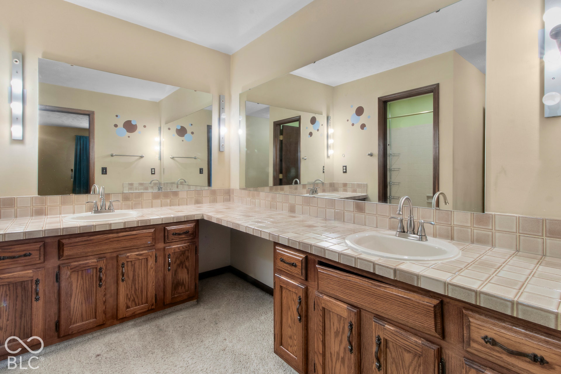 Oversized double vanities and private shower room in Primary Bath