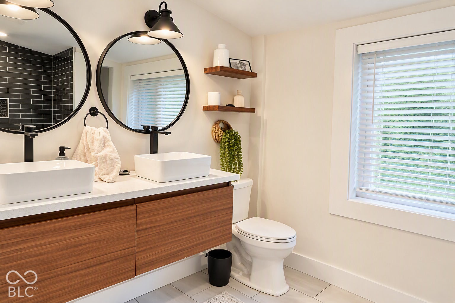 Dual vessel sinks with matte black fixtures