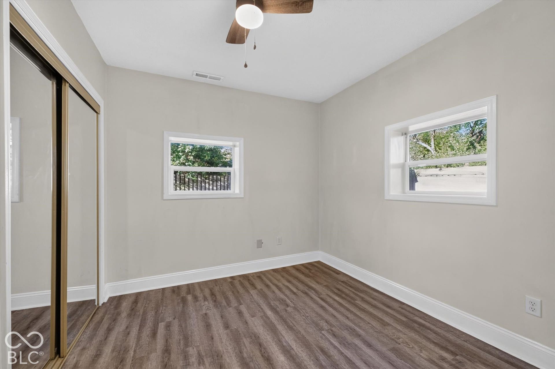 8404 Union Chapel Road, Indianapolis, IN 46240 LVP floors, ceiling fan, and mirrored closet doors
