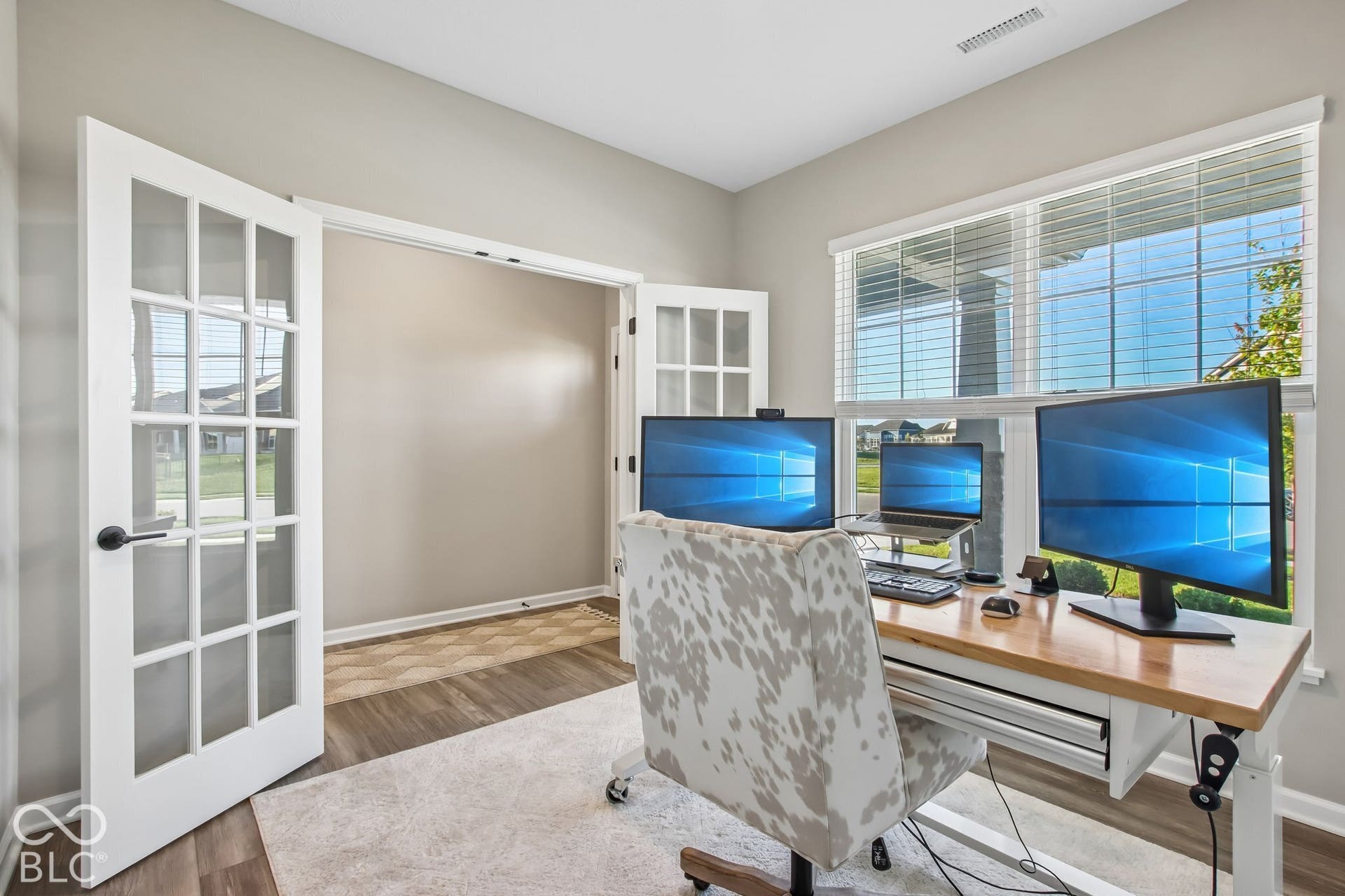 French doors with clear glass panes and black hardware