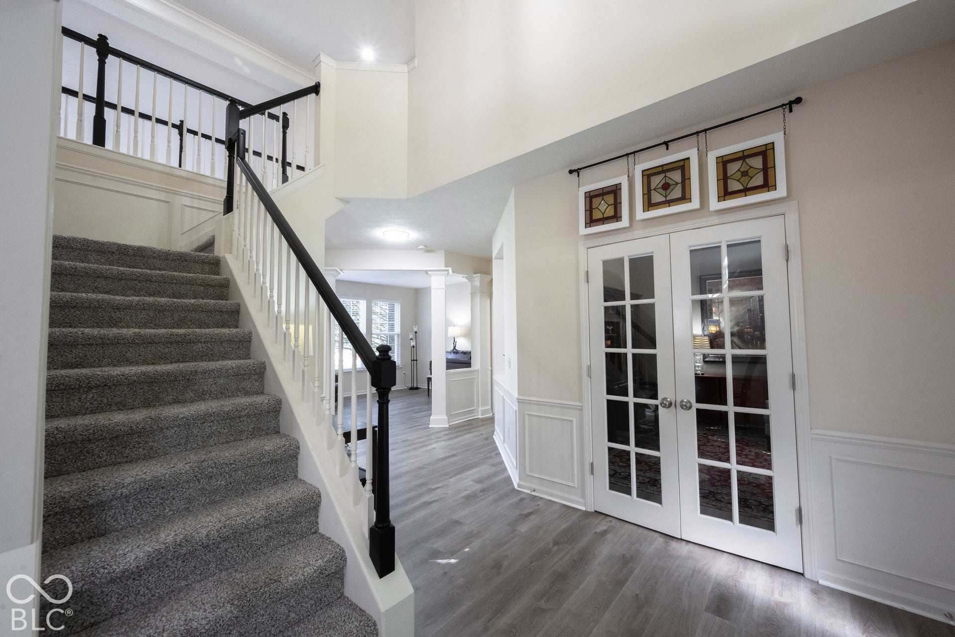 French doors on the den that is off of the entry