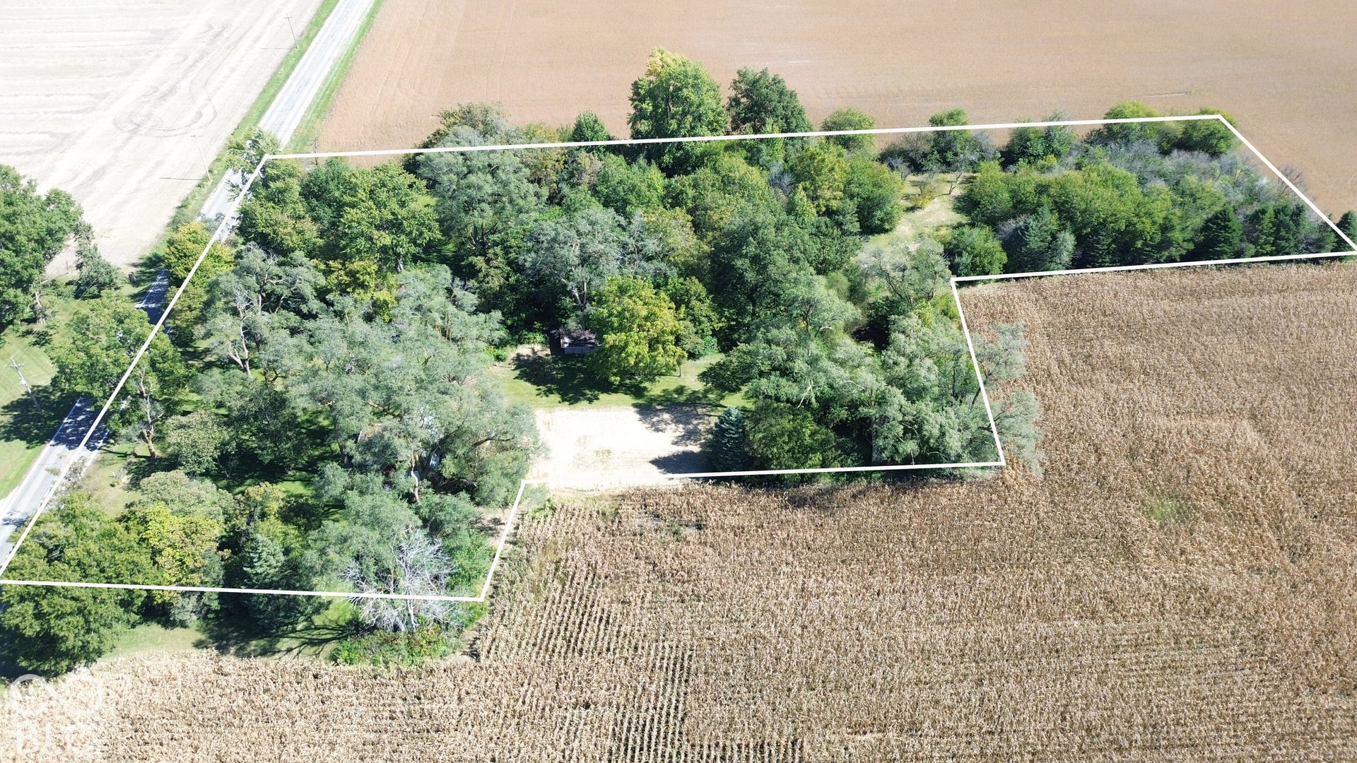Overview of building lot from West