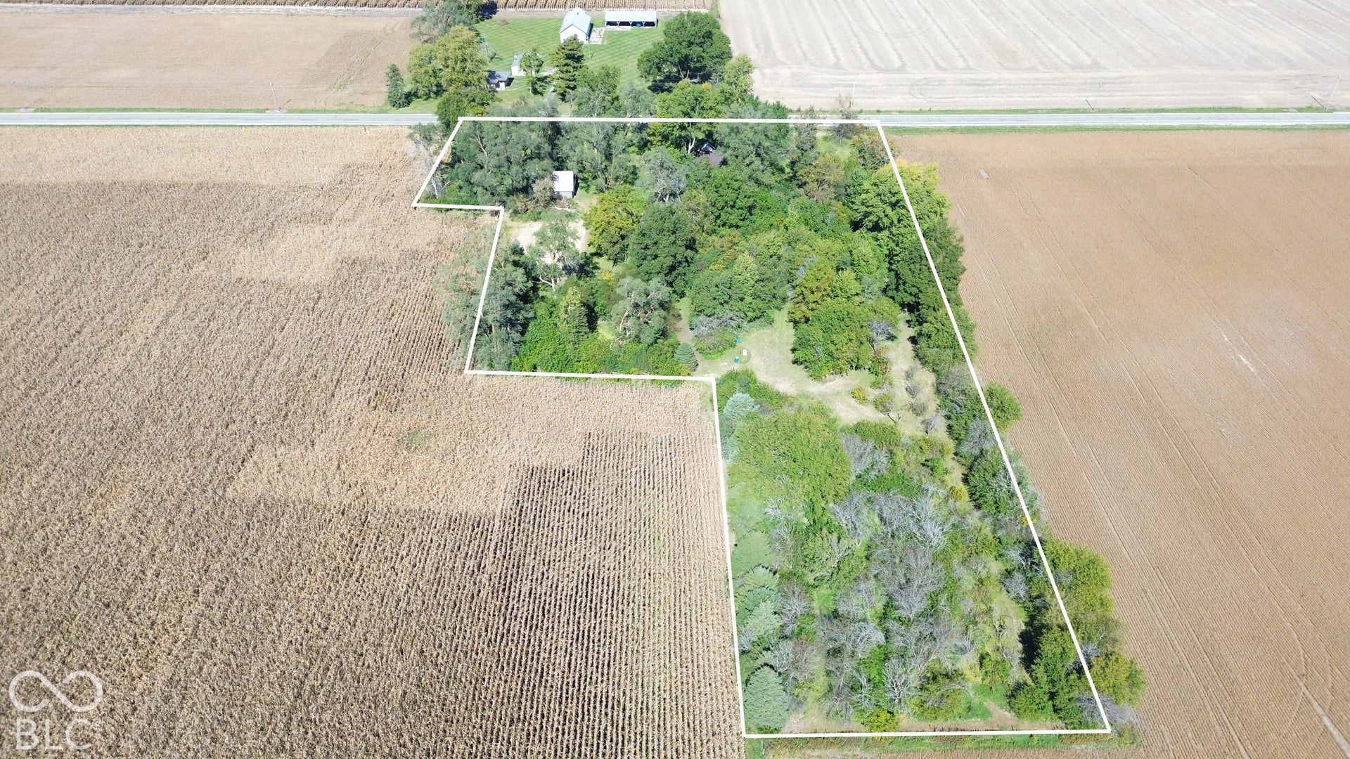 Overview of building lot from South