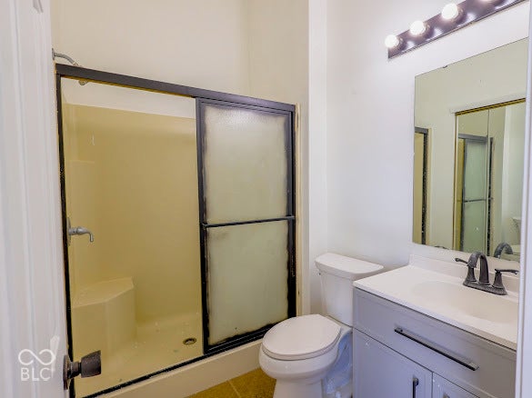 Shower with built-in bench seating and sliding glass door