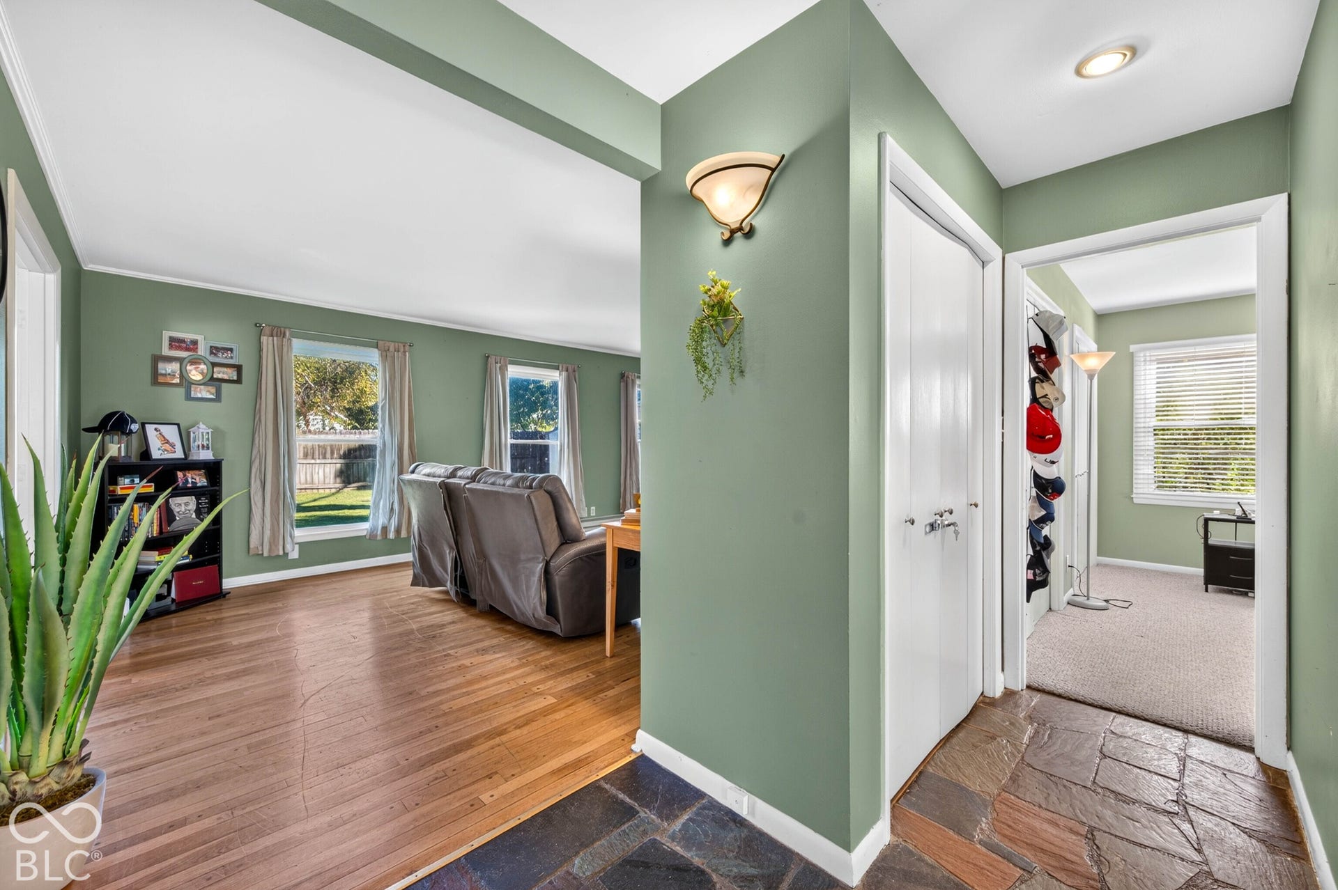 Slate-style flooring entryway with an overhead recessed light