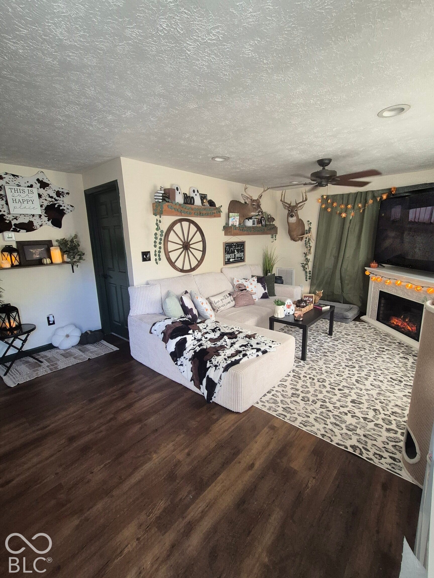 Wood-finish flooring throughout the space