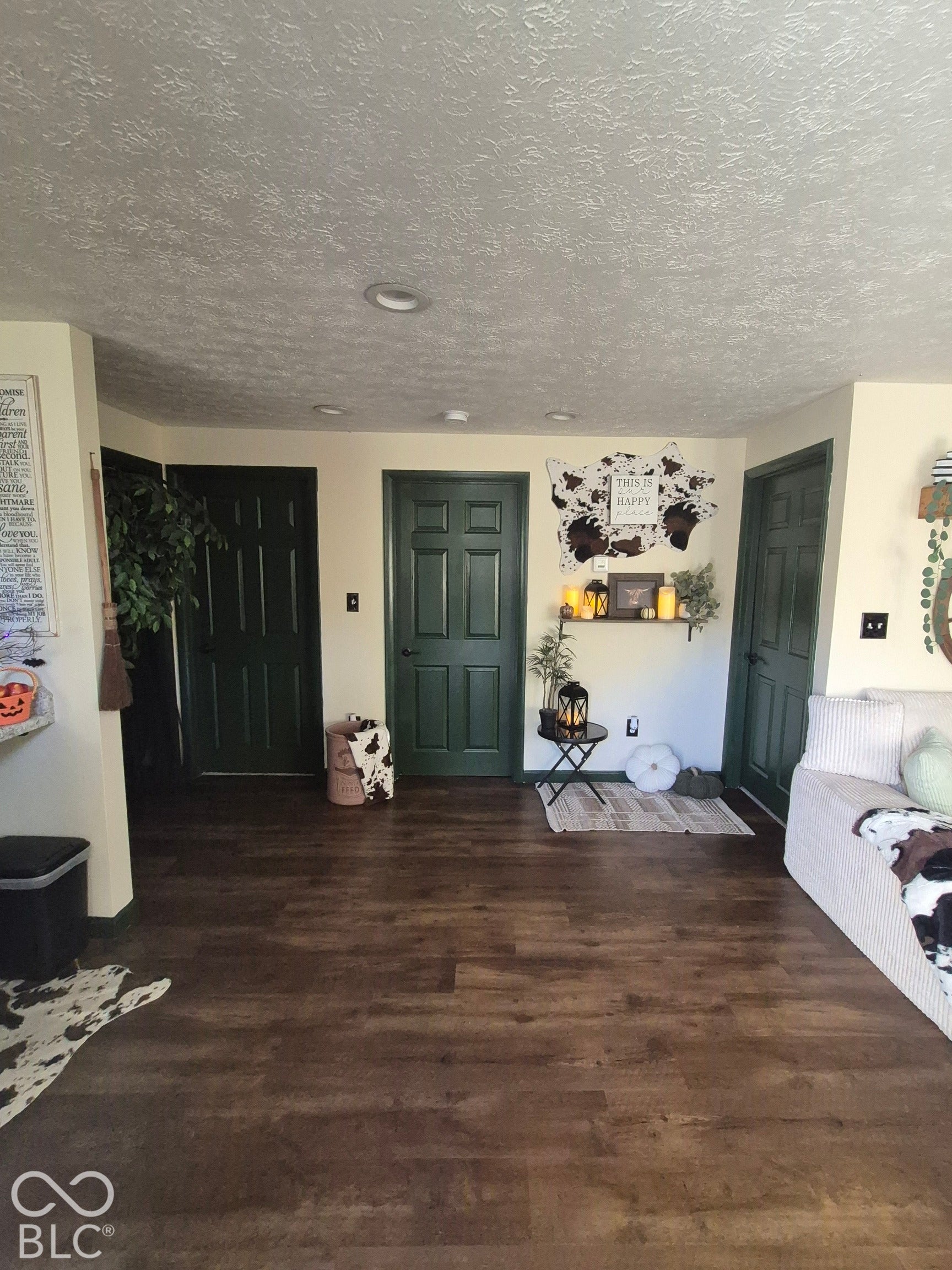 Wood-finish flooring throughout the space