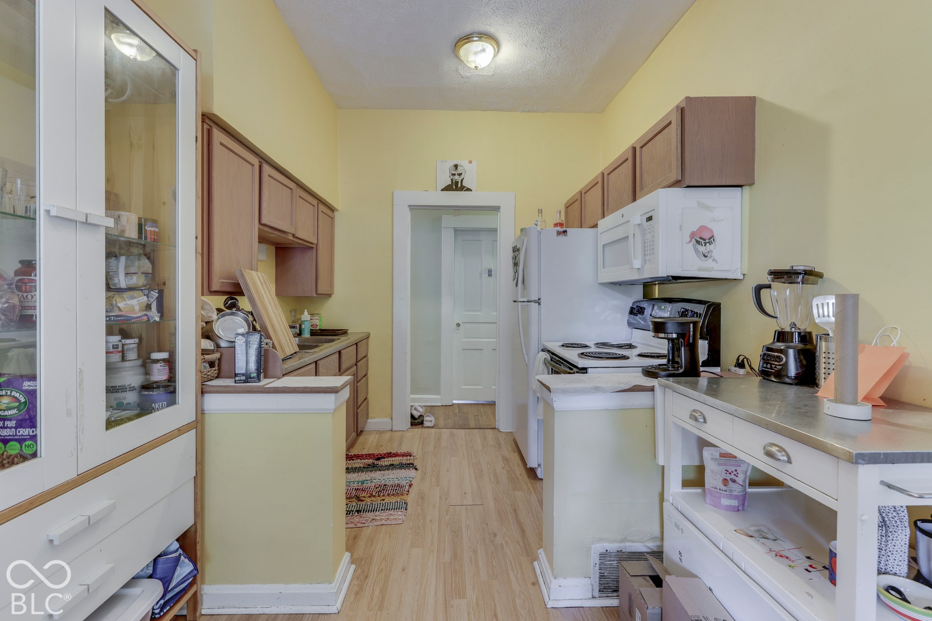 Unit 2 Wood-finish flooring with light-toned wall paint