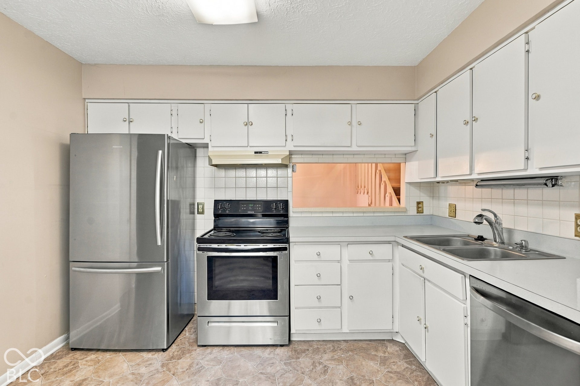 Kitchen with convenient pass-through.
