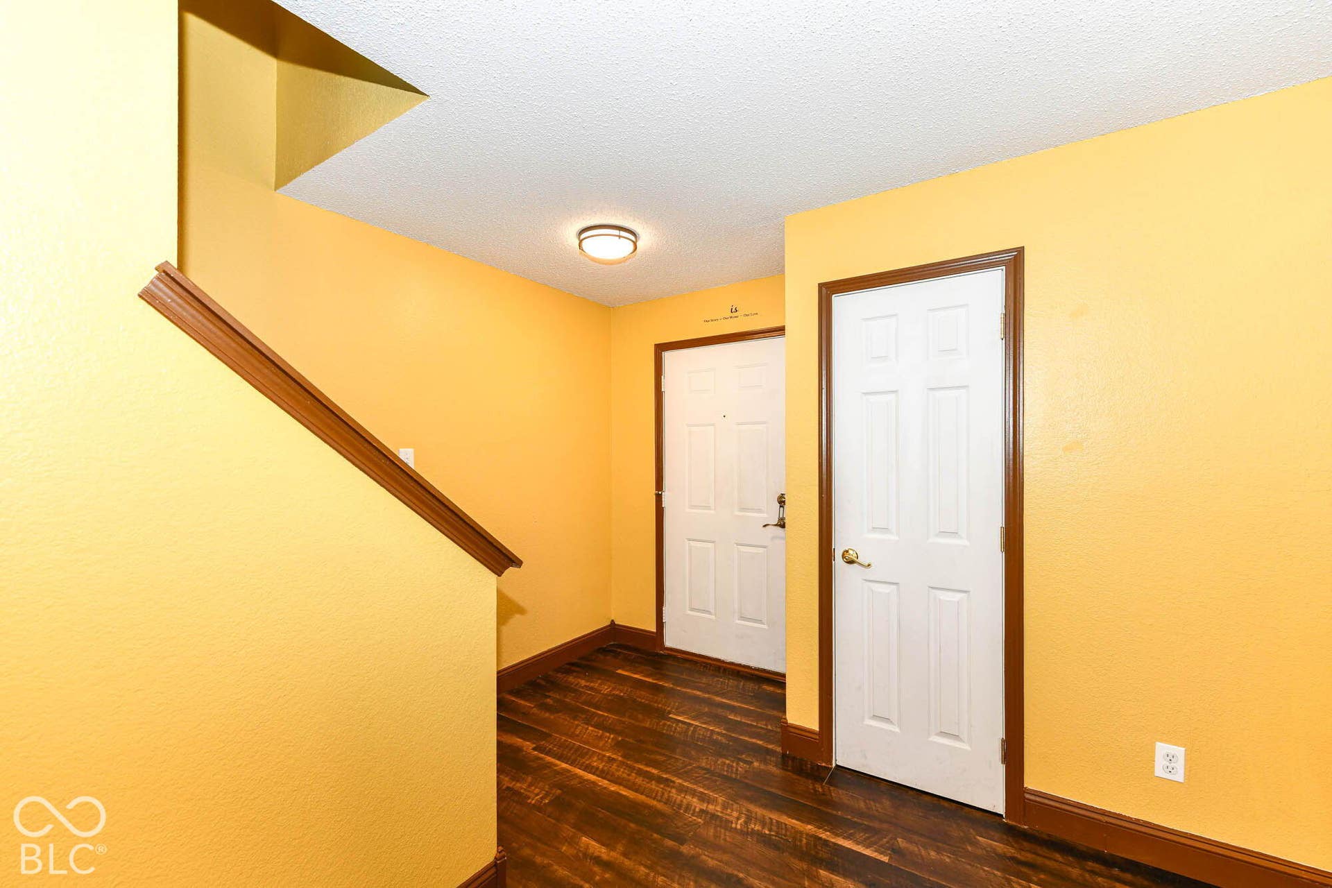 Wood-finish flooring with a contrasting dark trim