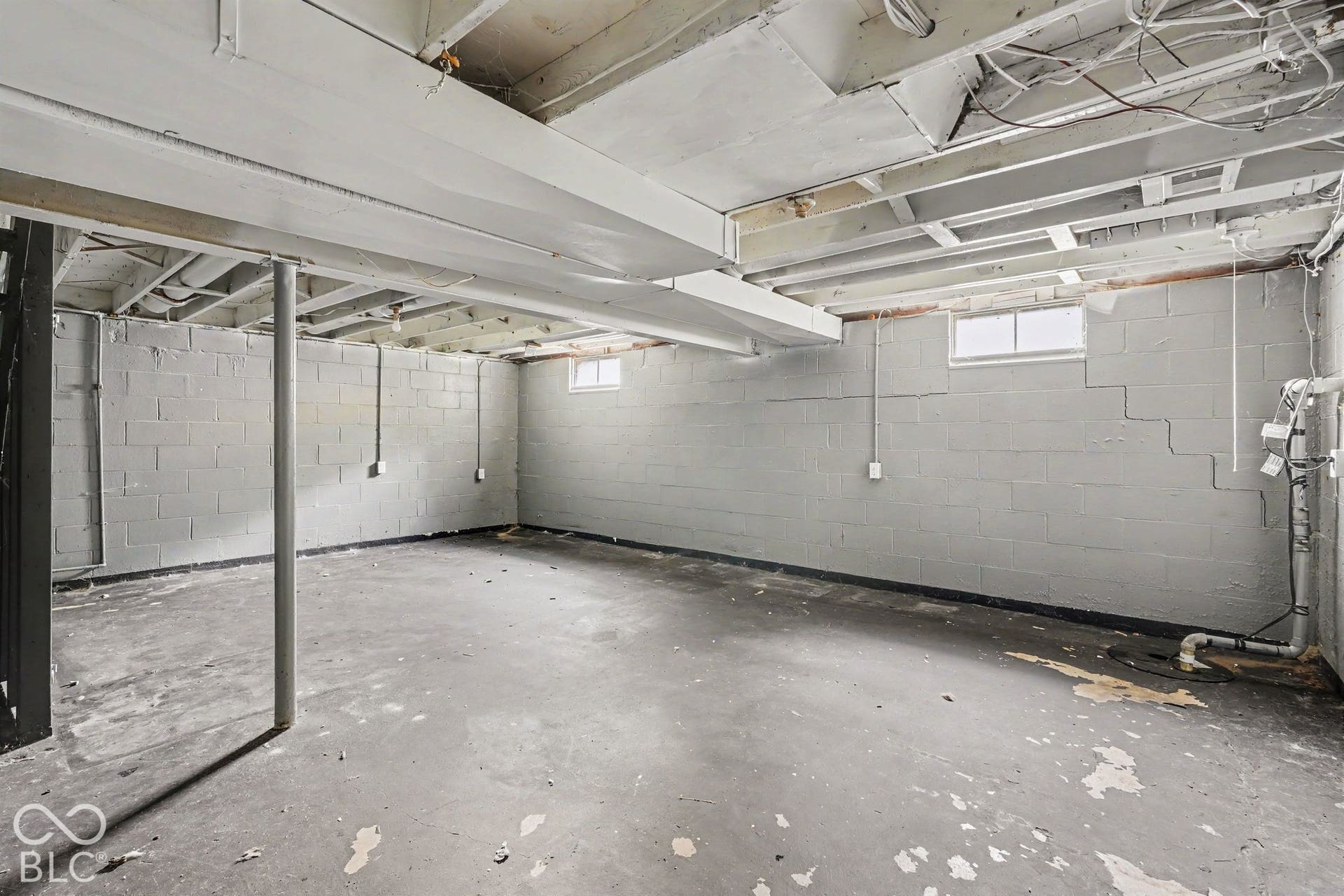 Concrete foundation walls with a light gray finish