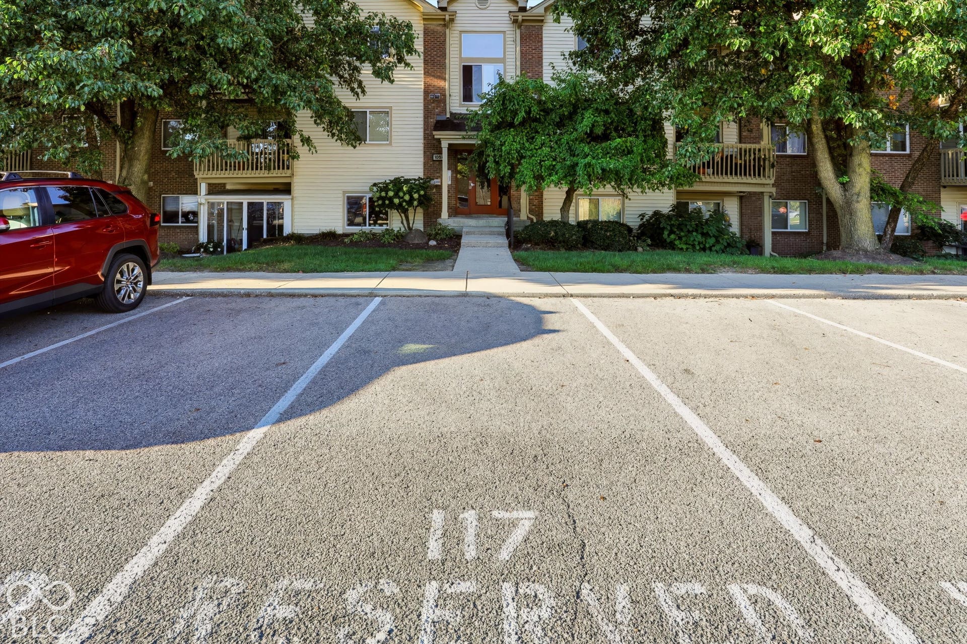 Assigned Parking Space #117, right in front of the entrance for easy unloading.