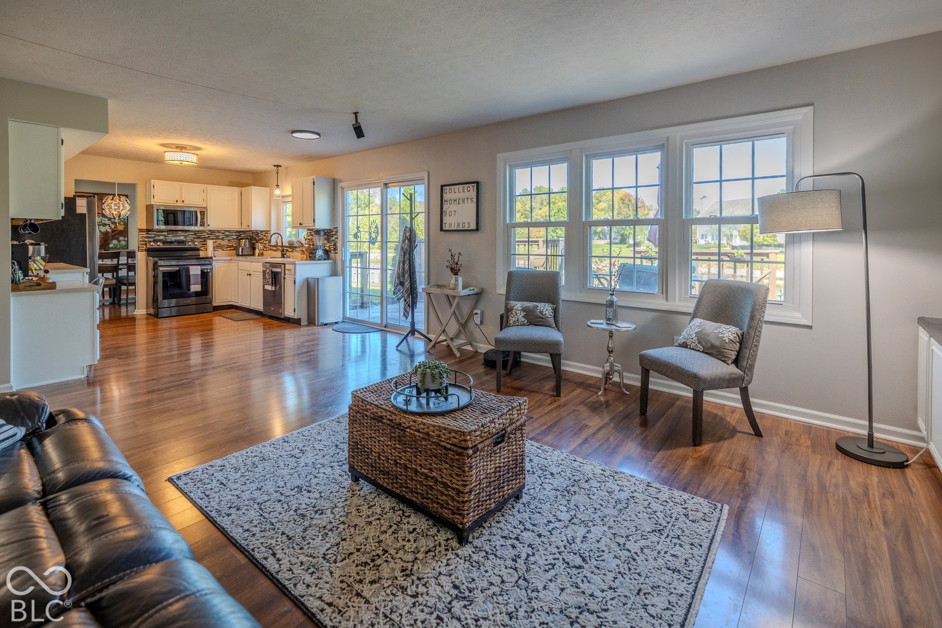 6416 Manchester Drive, Fishers, IN 46038 Enjoy peaceful pond views from the inviting family room, where large windows fill the space with natural light and let in the refreshing autumn breeze. Step outside to the spacious deck and enjoy the beauty of the park-like backyard.