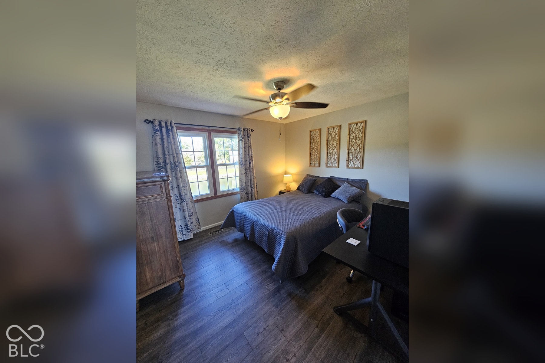 6416 Manchester Drive, Fishers, IN 46038 The second bedroom offers double windows for loads of natural light and ventilation with a ceiling fan and light fixture. The floors are newer water-proof wood laminate.