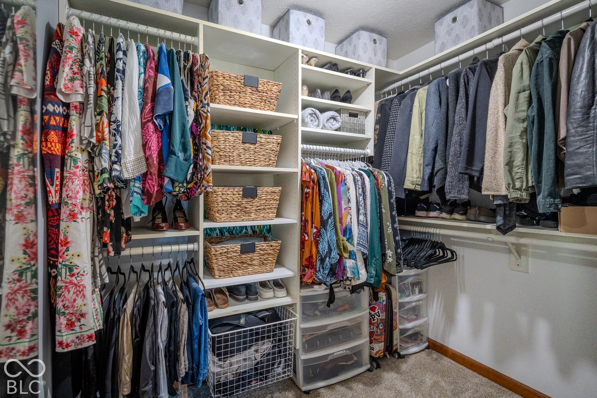 6416 Manchester Drive, Fishers, IN 46038 Walk-in closet featuring built-in shelving, multiple hanging rods, and recessed lighting