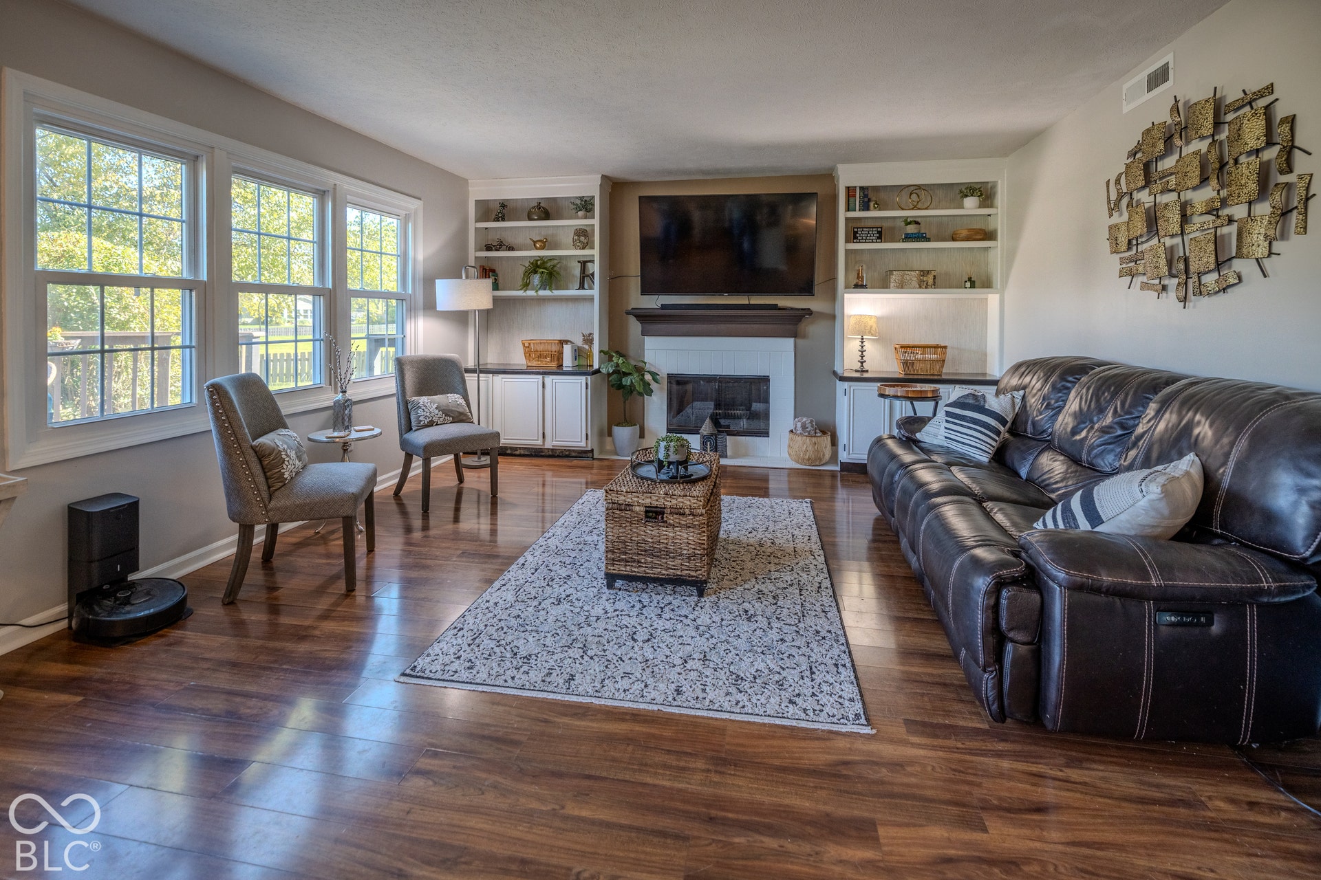 6416 Manchester Drive, Fishers, IN 46038 Gather, relax, and make memories in this spacious family room, filled with natural light from large windows and warmed by a cozy fireplace. The inviting layout offers plenty of room for game nights, Friday movie nights, and relaxing together.