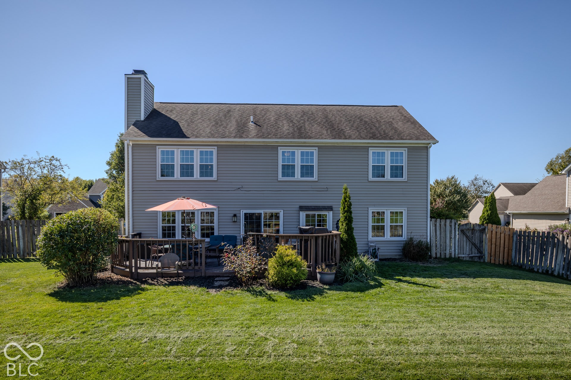 6416 Manchester Drive, Fishers, IN 46038 This home features a multi-level deck, lush landscaping and low maintenance exterior.