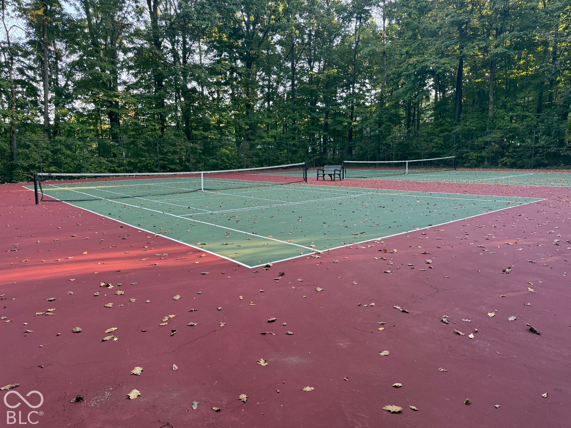 6416 Manchester Drive, Fishers, IN 46038 Neighborhood Tennis Courts in a serene wooded setting.