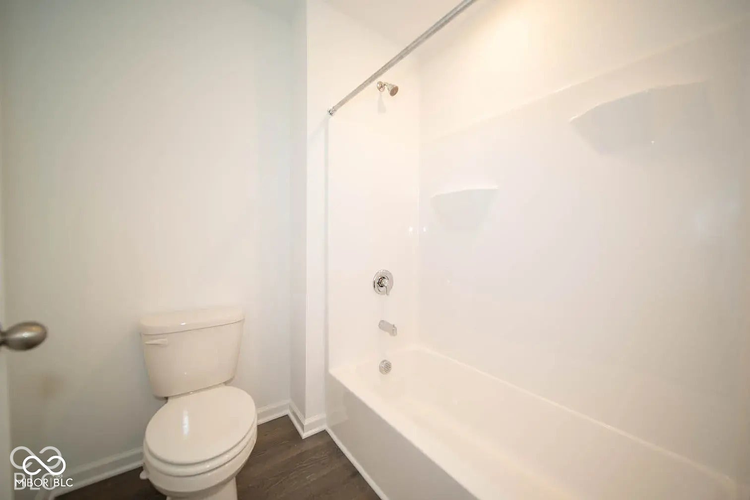 5778 Aleppo Lane, Greenwood, IN 46143 White acrylic bathtub and shower surround with integrated shelving