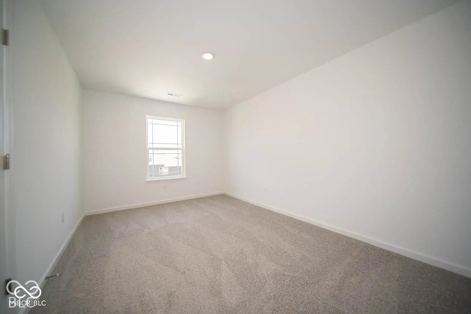 5778 Aleppo Lane, Greenwood, IN 46143 Recessed lighting, light gray carpeting, and a white framed window
