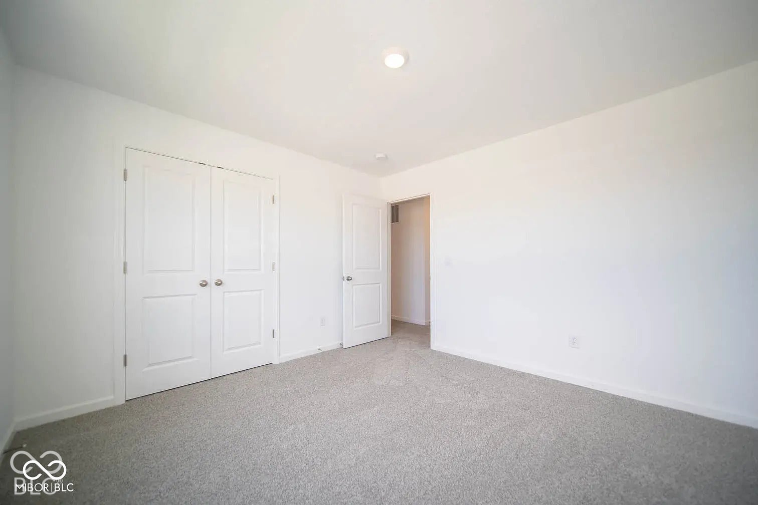 5778 Aleppo Lane, Greenwood, IN 46143 Wall-to-wall carpeting, bright white walls, recessed ceiling lighting, and panel doors