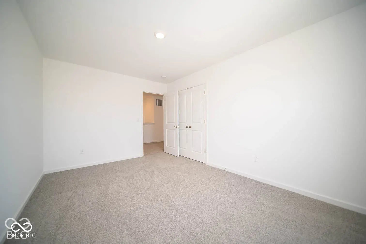 5778 Aleppo Lane, Greenwood, IN 46143 Recessed ceiling light, neutral wall paint, light-colored carpeting, and double panel doors