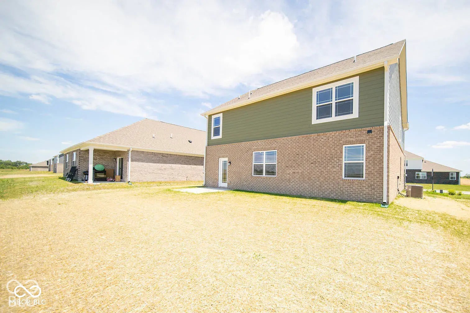5778 Aleppo Lane, Greenwood, IN 46143 Expansive backyard with a concrete patio