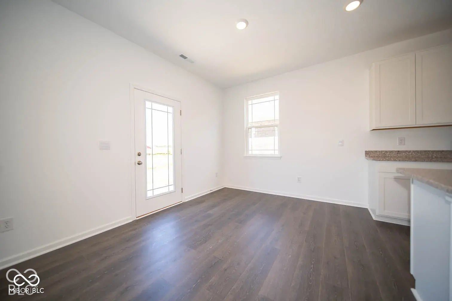 5778 Aleppo Lane, Greenwood, IN 46143 Wood-finish flooring, white walls, and recessed lighting