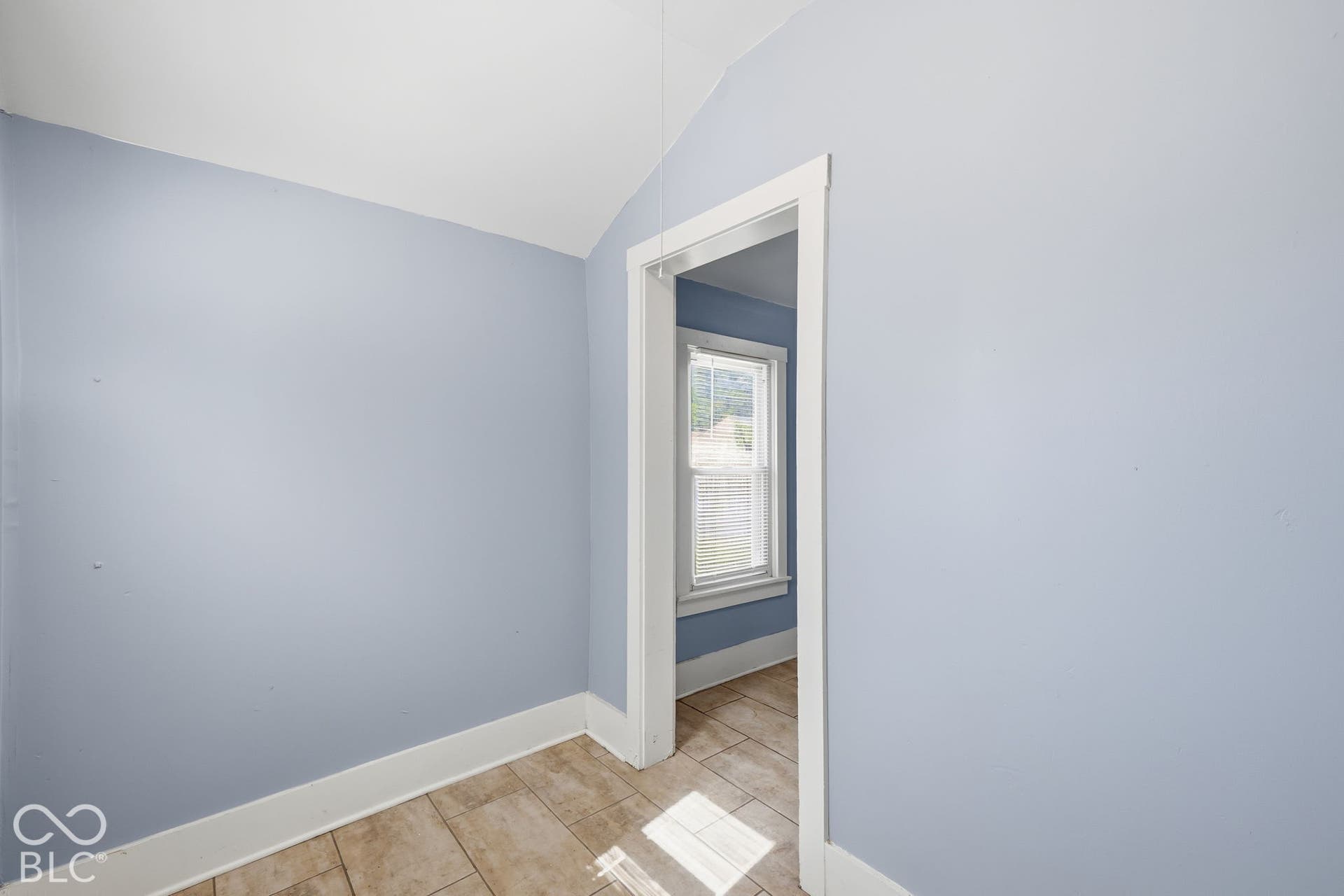 Tiled flooring throughout