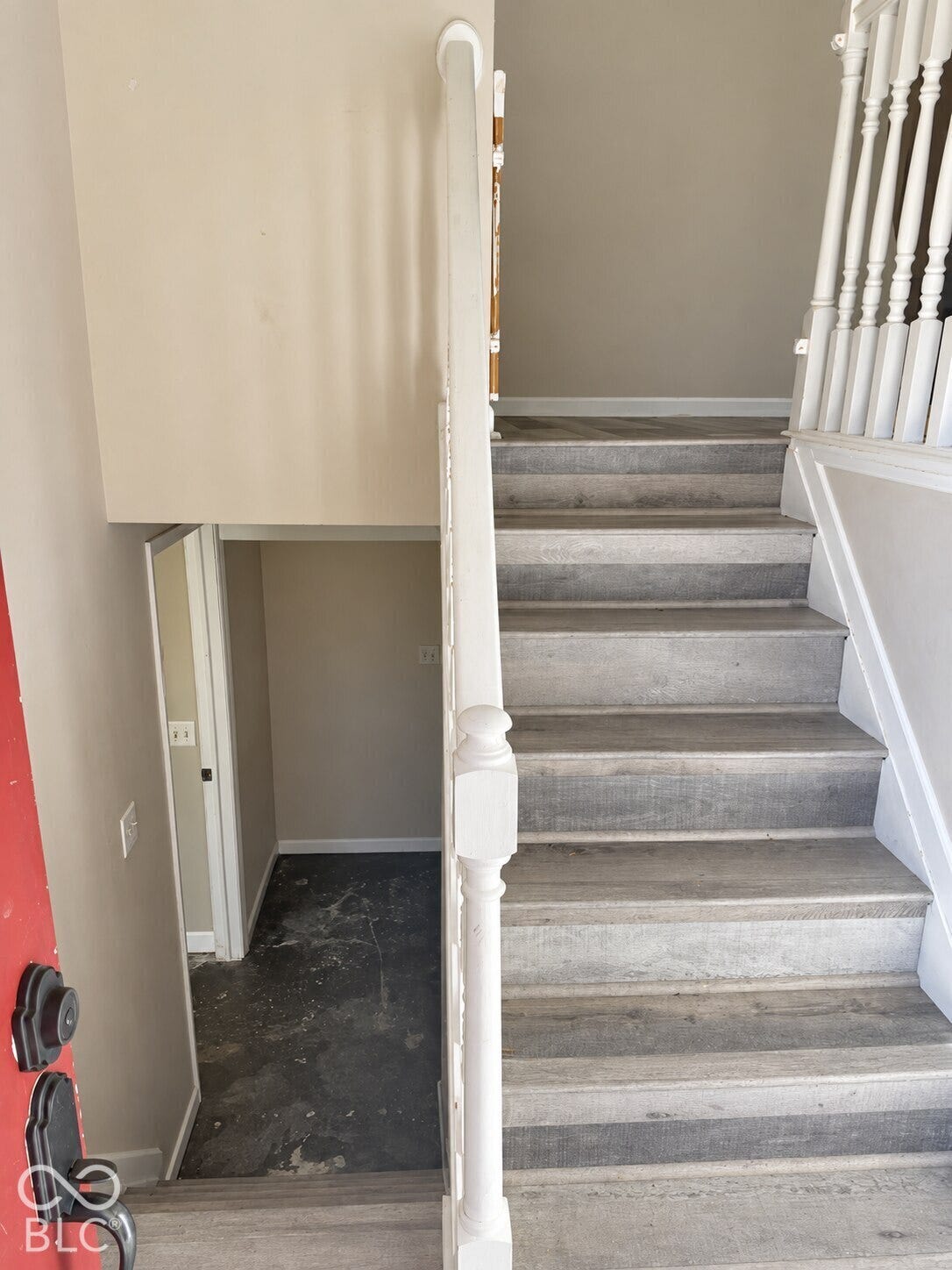 ENTRY STAIRWAYS UP TO MAIN LEVEL AND DOWN TO BASEMENT