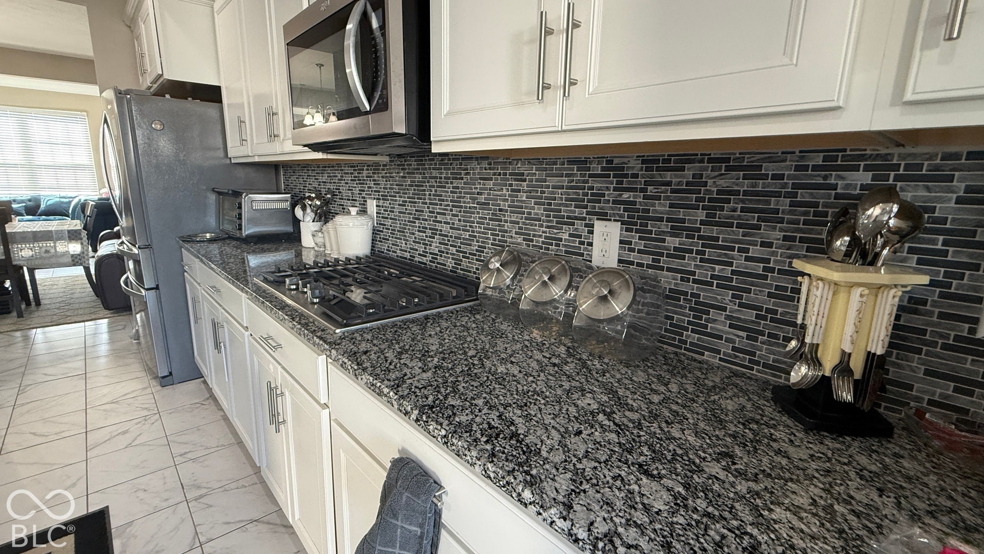 White cabinetry with brushed nickel hardware