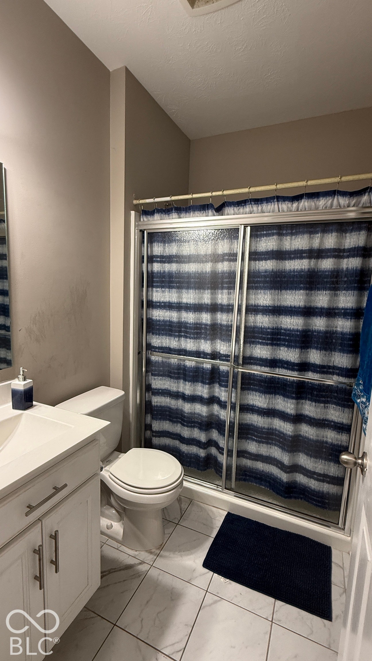 White vanity with silver hardware