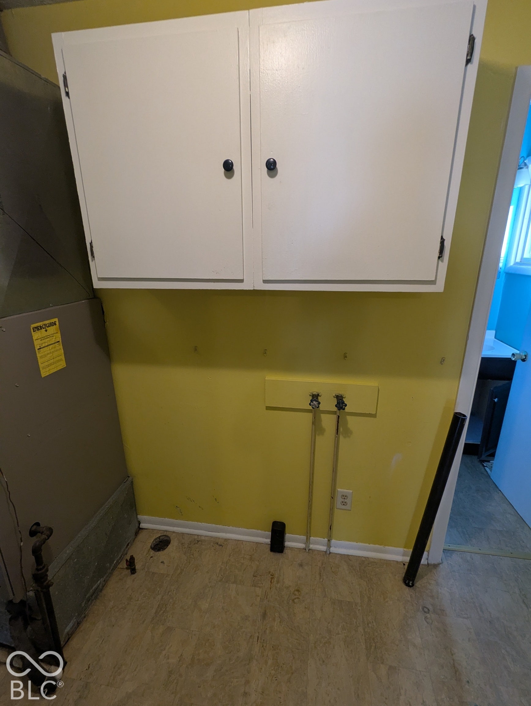 364 Robbins Drive, Greenwood, IN 46142 Wall-mounted cabinetry, utility connections, and neutral flooring