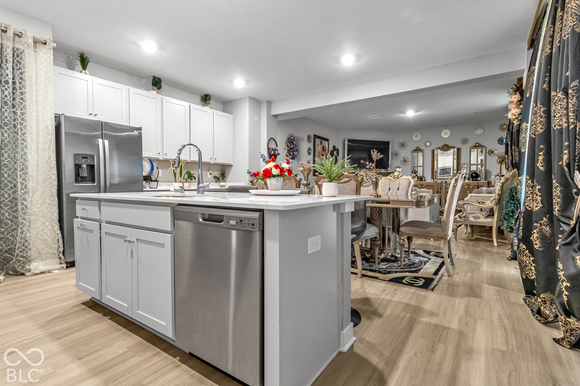 Kitchen island with integrated sink and stainless steel dishwasher