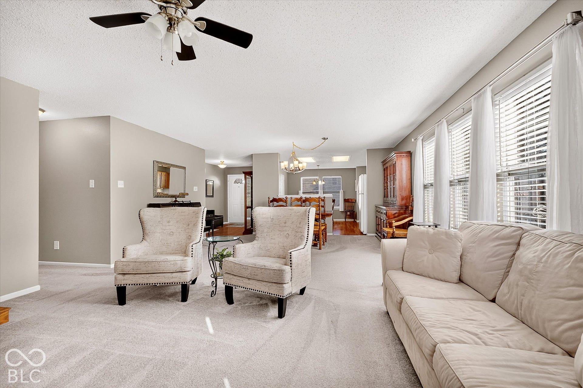 12980 Coyote Run, Fishers, IN 46038 Living room has an abundance of natural light