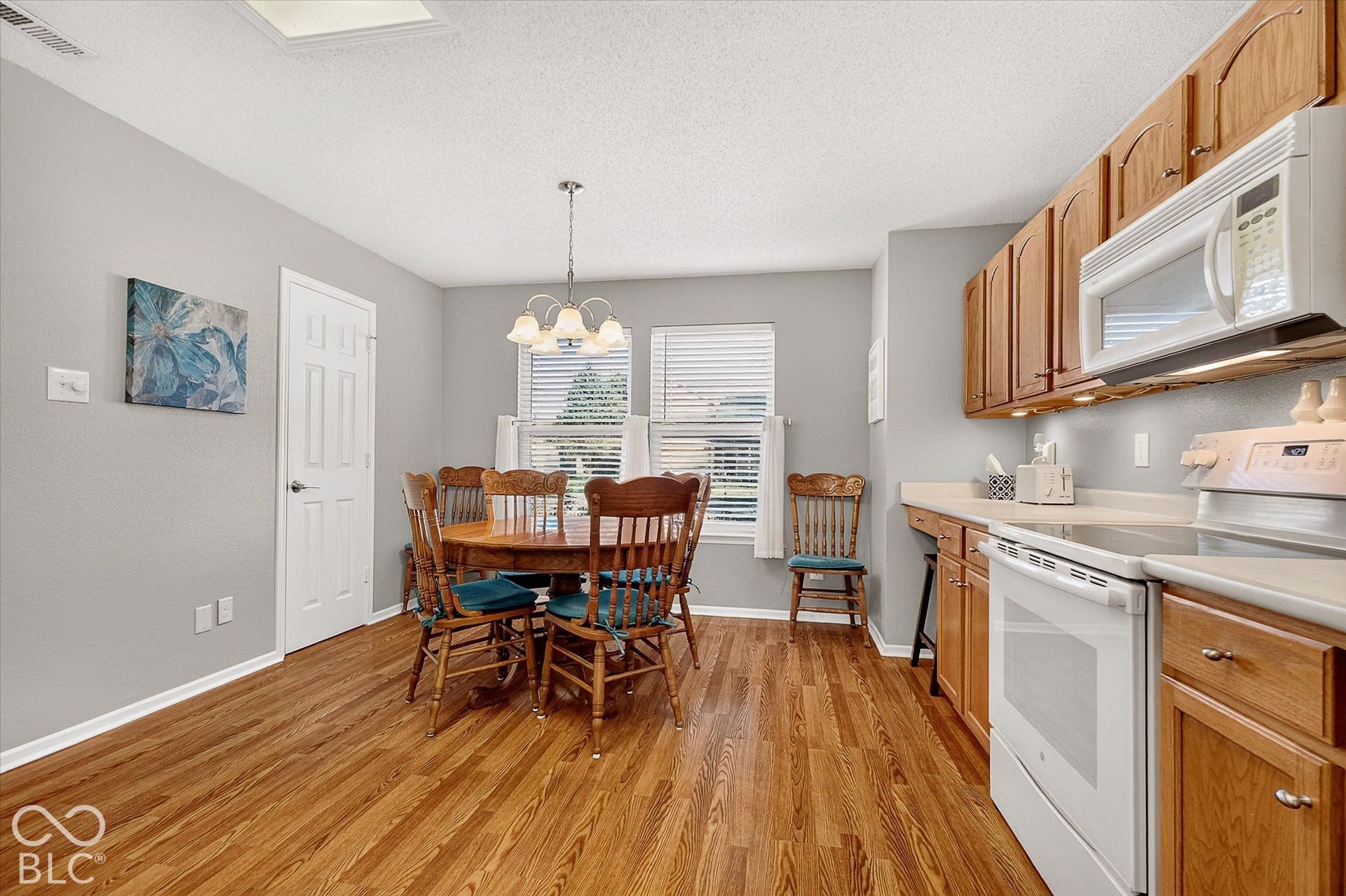 12980 Coyote Run, Fishers, IN 46038 Light and bright kitchen with plenty of space for dining and a nice sized pantry.