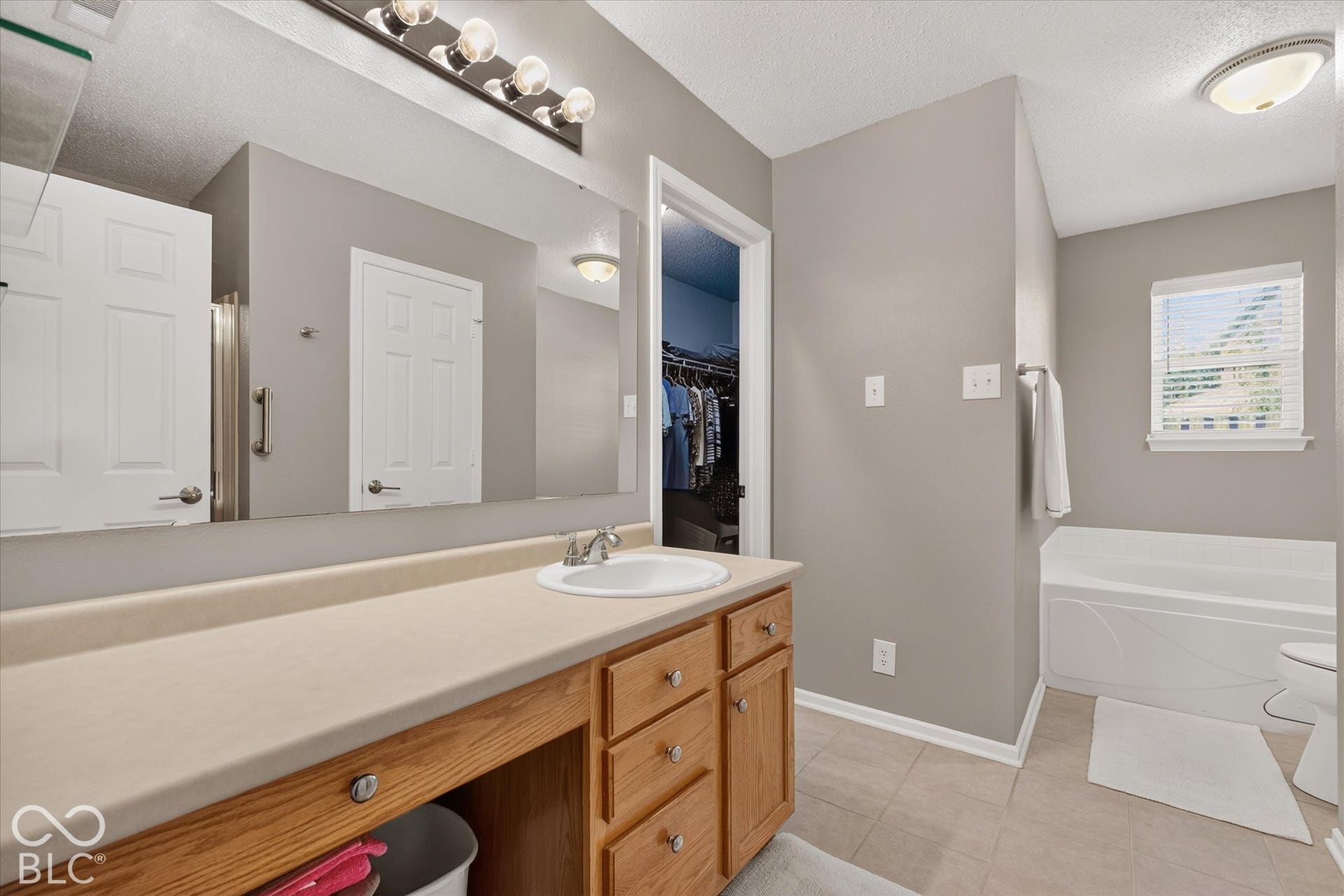 12980 Coyote Run, Fishers, IN 46038 Primary bedroom has walk-in closet, oversized vanity, jetted tub and shower stall.