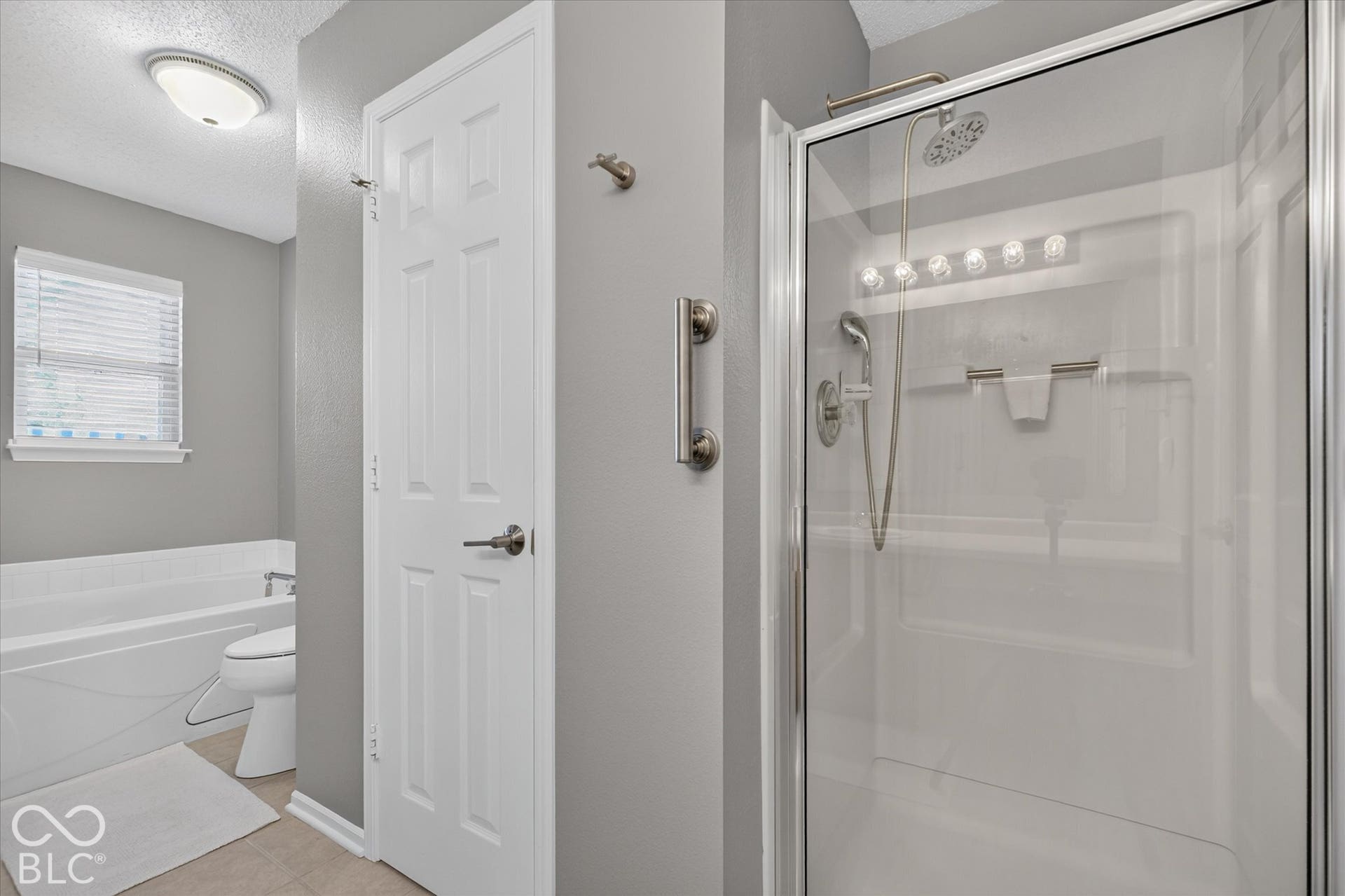 12980 Coyote Run, Fishers, IN 46038 Spacious shower enclosure with glass surround and rain shower head