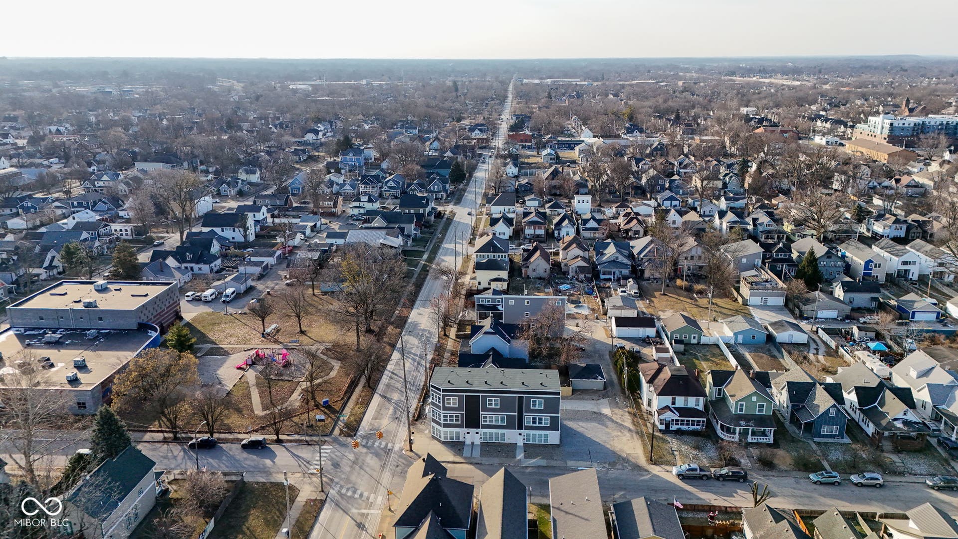aerial overview of property's location featuring nearby suburban area