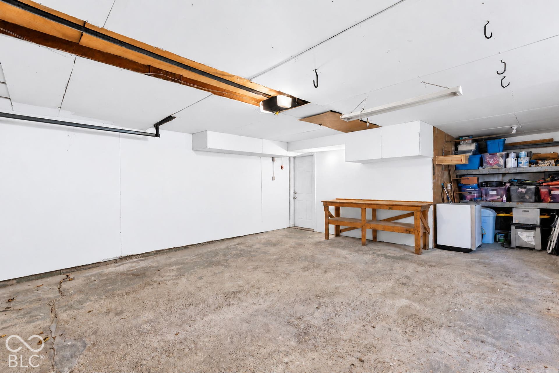 extra space in this two car garage feels like a 2.5 car garage