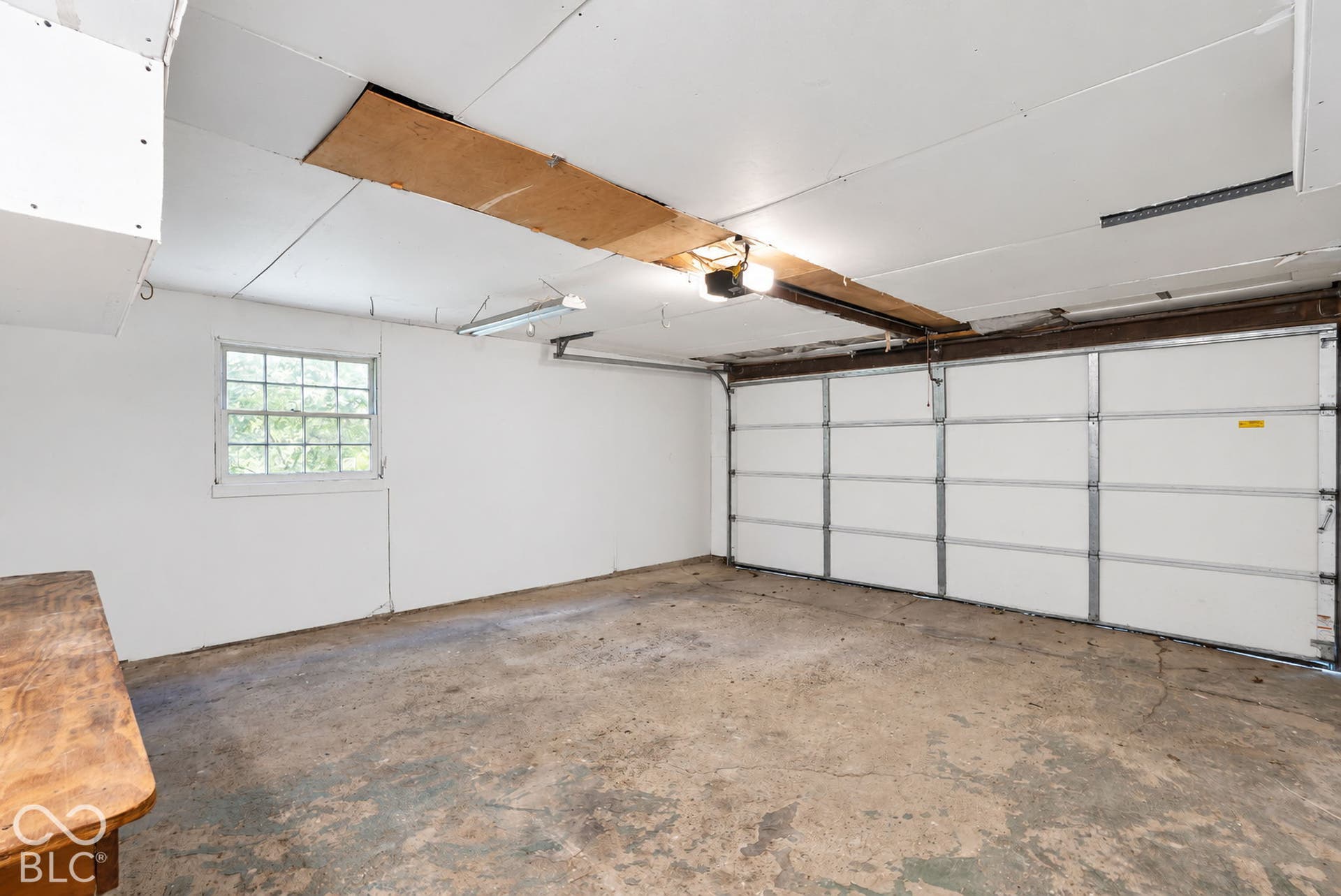 Clean and spacious garage that would be great for storage or tinkering
