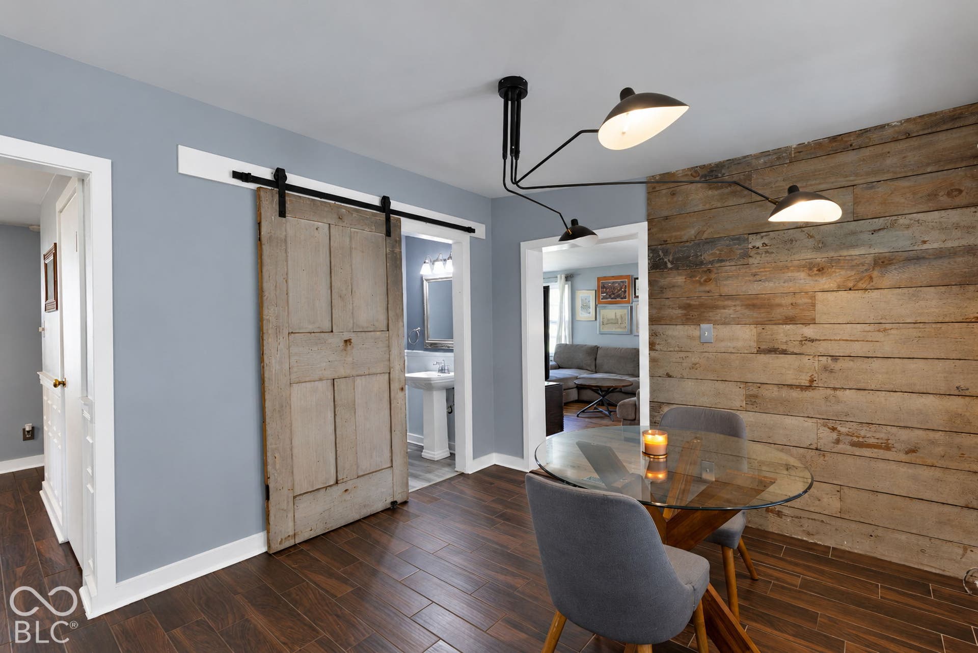 Wood-finish flooring with a horizontal wood plank accent wall