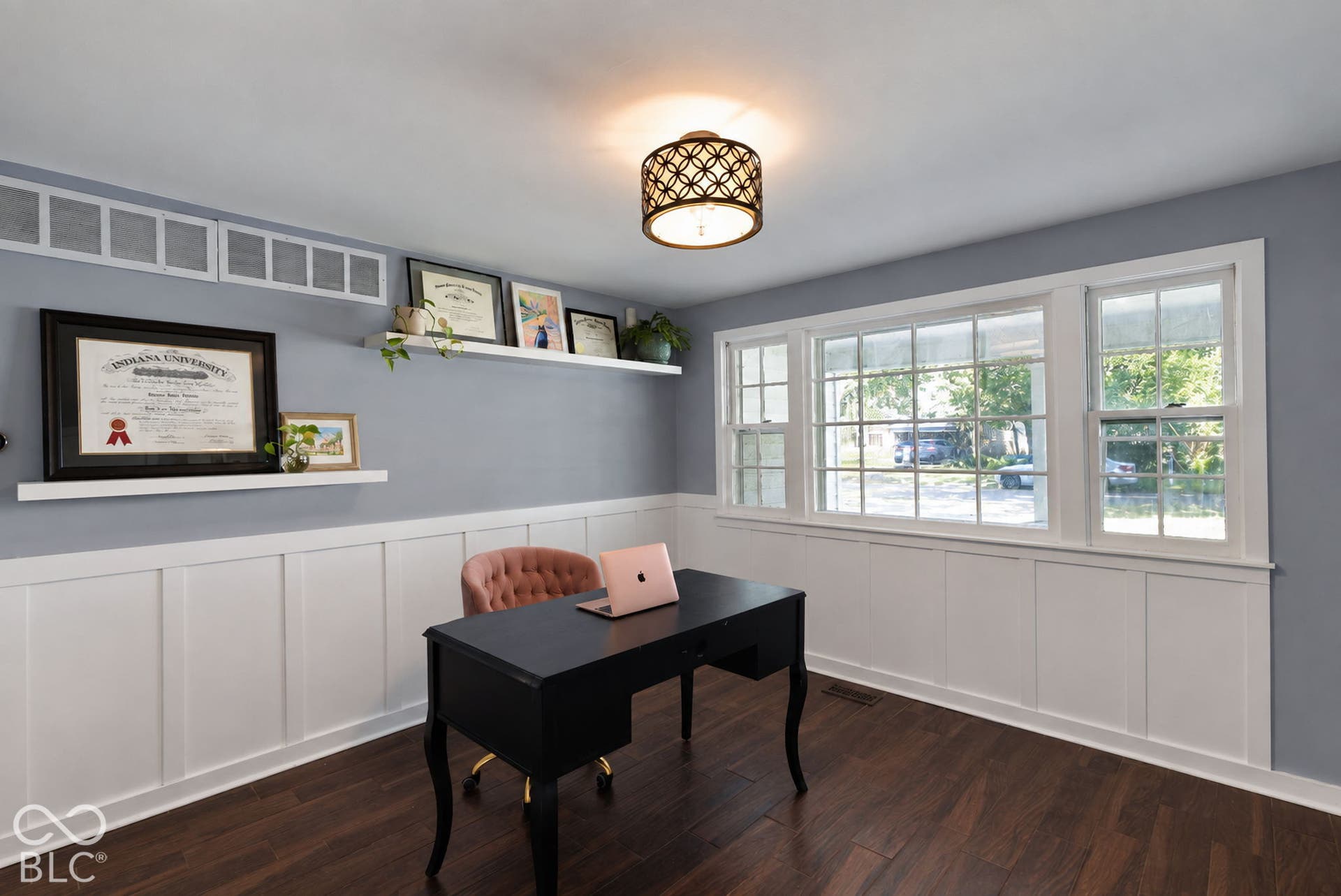 Home office space could also serve as a formal dining room.