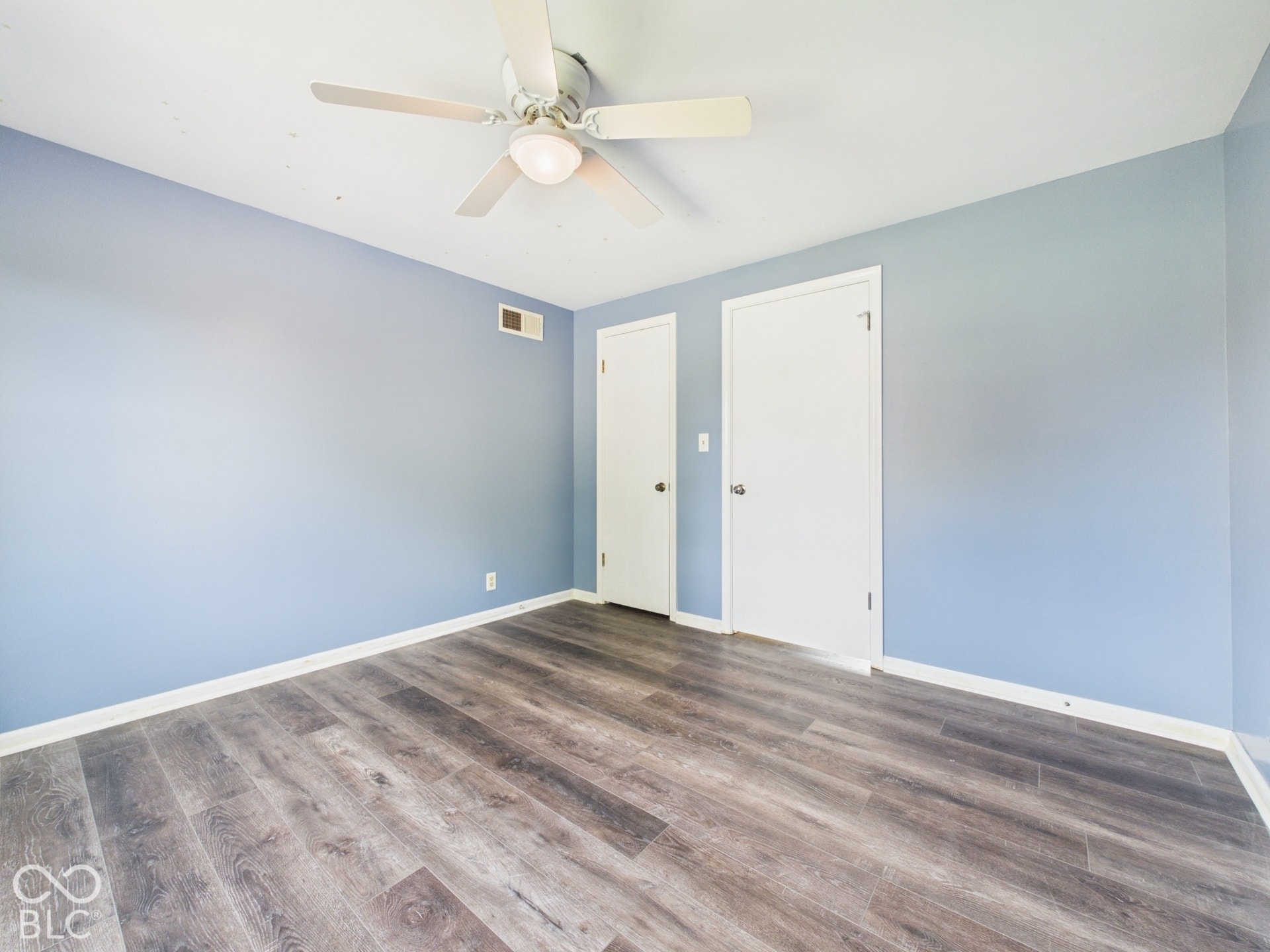 Wood-finish flooring with white trim