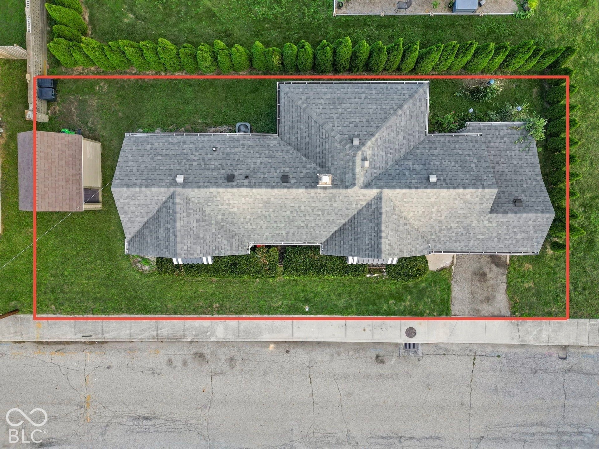 The shed does come with the property and does not extend the property line.