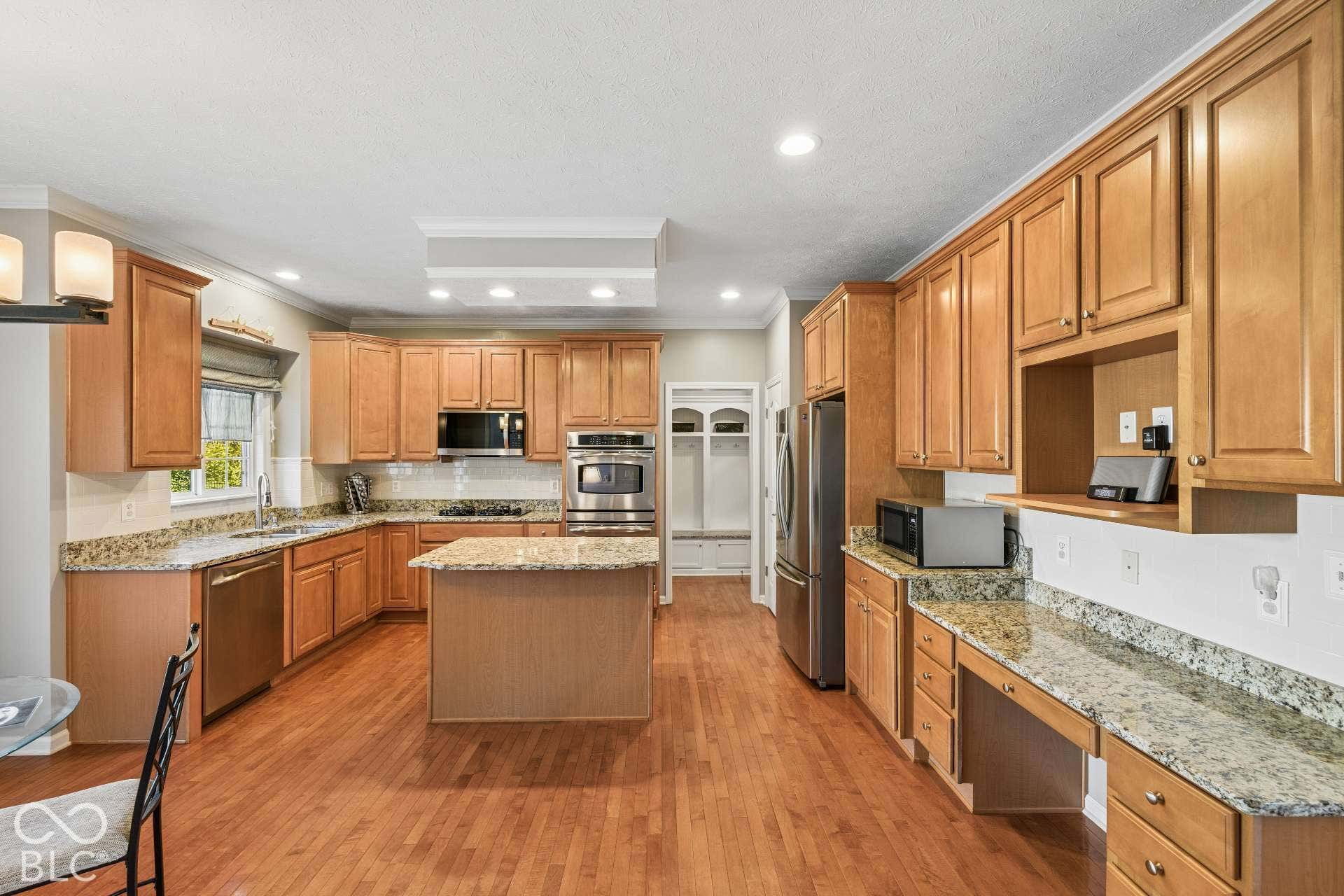Abundant cabinetry and counter space provide the storage and workspace buyers appreciate in an everyday kitchen.
