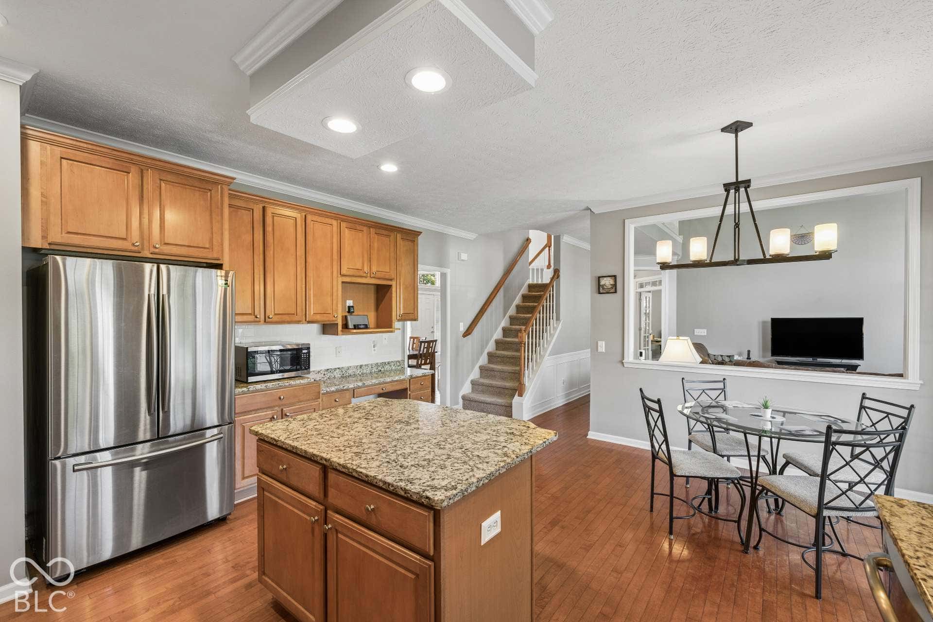 Spacious Kitchen. Center island, abundant cabinetry and generous counter space provide plenty of room to cook, gather and entertain.
